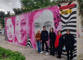 Un murales per la campagna #Iolochiedo di Amnesty